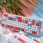 Detailed shot of a Red Lips Pop Art keycap set for custom keyboards, showcasing its striking retro design with vibrant red lips and dynamic blue waves.