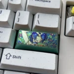 Explore a gallery of Chainsaw Man: Reze Themed Titanium Keycaps, each angle revealing vibrant abstract patterns and unique artistry on the durable metallic allure.