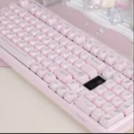 Ethereal Rococo Angel Pearlescent PBT keycap set from multiple angles, showcasing its ornate design, pastel hues, and shimmering finish.