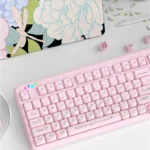 Multiple angles of the exquisite Ethereal Rococo Angel Pearlescent PBT keycap set, highlighting its ornate design, delicate pastel hues, and shimmering finish.