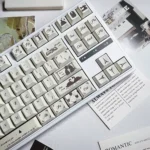 Close-up of the Encounter Romantic Series Keycap Set, showcasing its durable PBT construction and full dye-sublimation of delicate pastel illustration.