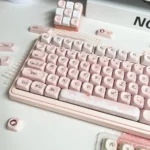 Exquisite Rose PBT Keycaps Set with a romantic diary design, featuring delicate roses and vintage letter motifs, showcased from multiple artistic angles.