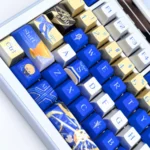A close-up of Saber Excalibur metallic coating PBT dye-sub keycaps set, highlighting the intricate Saber-themed dye-sublimation and premium metallic sheen.