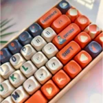 A close-up view of the whimsical Santa Claus Keycap Set, showcasing vibrant PBT dye-sub keycaps featuring festive Santa Claus and Christmas icons from various angles.