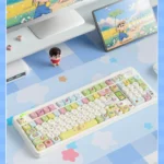 Vibrant Shin-chan PBT dye-sub keycap set, viewed from a unique angle, emphasizing its durable construction and playful cartoon artwork.