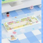 Close-up of a vibrant Shin-chan PBT dye-sub keycap set, showcasing mischievous Crayon Shin-chan characters and crisp, durable legends from a playful angles.