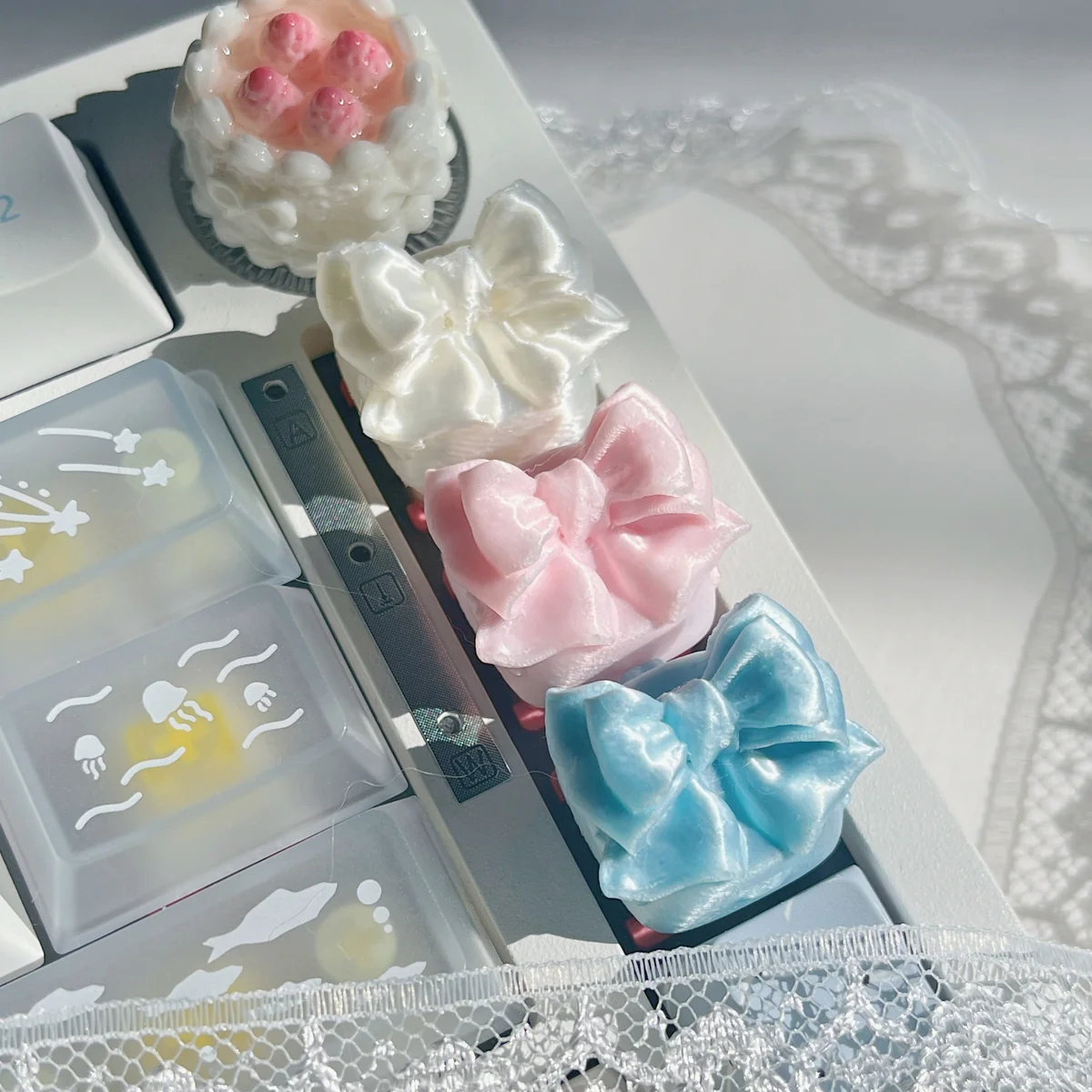 Close-up of an ethereal handcrafted silk bow butterfly artisan keycap, showcasing its delicate wings and flowing silk, perfect for whimsical keyboards.