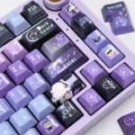 Close-up of a smooth, glossy Silver Wolf keycap set from the exclusive Honkai: Star Rail set, embodying a futuristic cyberpunk aesthetic.