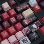 A playful close-up of the exclusive Sparkle Honkai Star Rail side-engraved keycaps set, highlighting their vibrant colors and distinctive character art.
