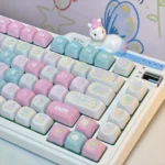 Spring Line Art PBT Keycaps set featuring playful, nature-inspired line art and subtle pastel accents, displayed from multiple angles. Durable PBT construction.