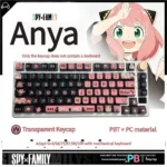 Vibrant Spy x Family PBT dye-sub backlit keycaps set featuring Anya, Loid, and Yor, glowing playfully on a mechanical keyboard.