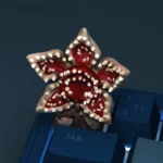 Handcrafted resin Stranger Things Demogorgon artisan keycap, detailed with a grotesque plant-like Upside Down creature, a collectible.
