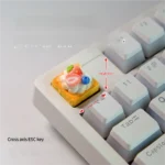 Handmade pink strawberry mille-feuille artisan keycap, showcasing vibrant cream and pink layers of hyper-realistic dessert art.