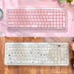 A charming pastel Stylish X100Pro Tri-Mode Membrane Keyboard with cute cat-inspired keycaps, soft RGB illumination, and silent tri-mode functionality.