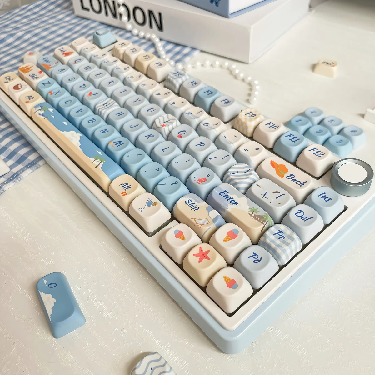 Close-up view of Serene Summer Beach PBT Dye-Sub Keycaps Set from various angles, showcasing vibrant sun-drenched designs and durable PBT material.