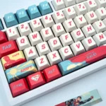 Detailed views of exclusive full-set DC Superman keycaps set, showcasing vibrant red and blue, the classic Superman emblem, and heroic comic book aesthetics.