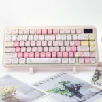 A gallery of Sweet cat PBT MOA profile keycaps set in pastel colors, showcasing whimsical feline designs from various angles, highlighting their durable material.