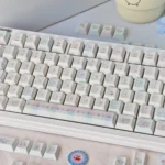 Delightful Sweet Marshmallow PBT dye-sub keycaps set, featuring soft pastel colors and whimsical designs viewed from different perspectives.