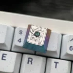 A gallery view of the handcrafted iridescent titanium Bulbasaur Pokemon keycap, revealing its vibrant details from various perspectives.