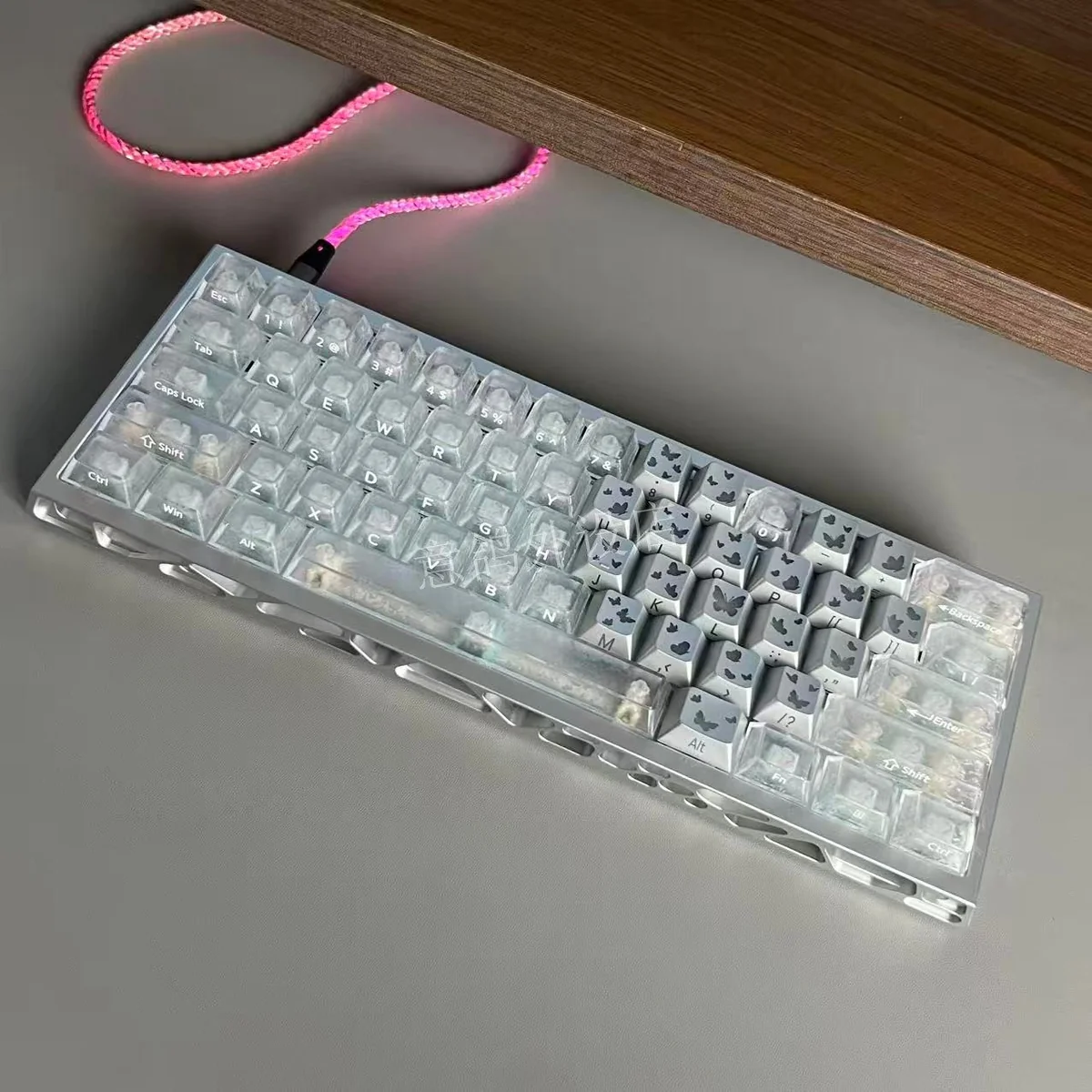 Multiple angles of premium forged carbon keycaps set, highlighting their unique texture and sleek side-lit legends for an immersive gaming experience.