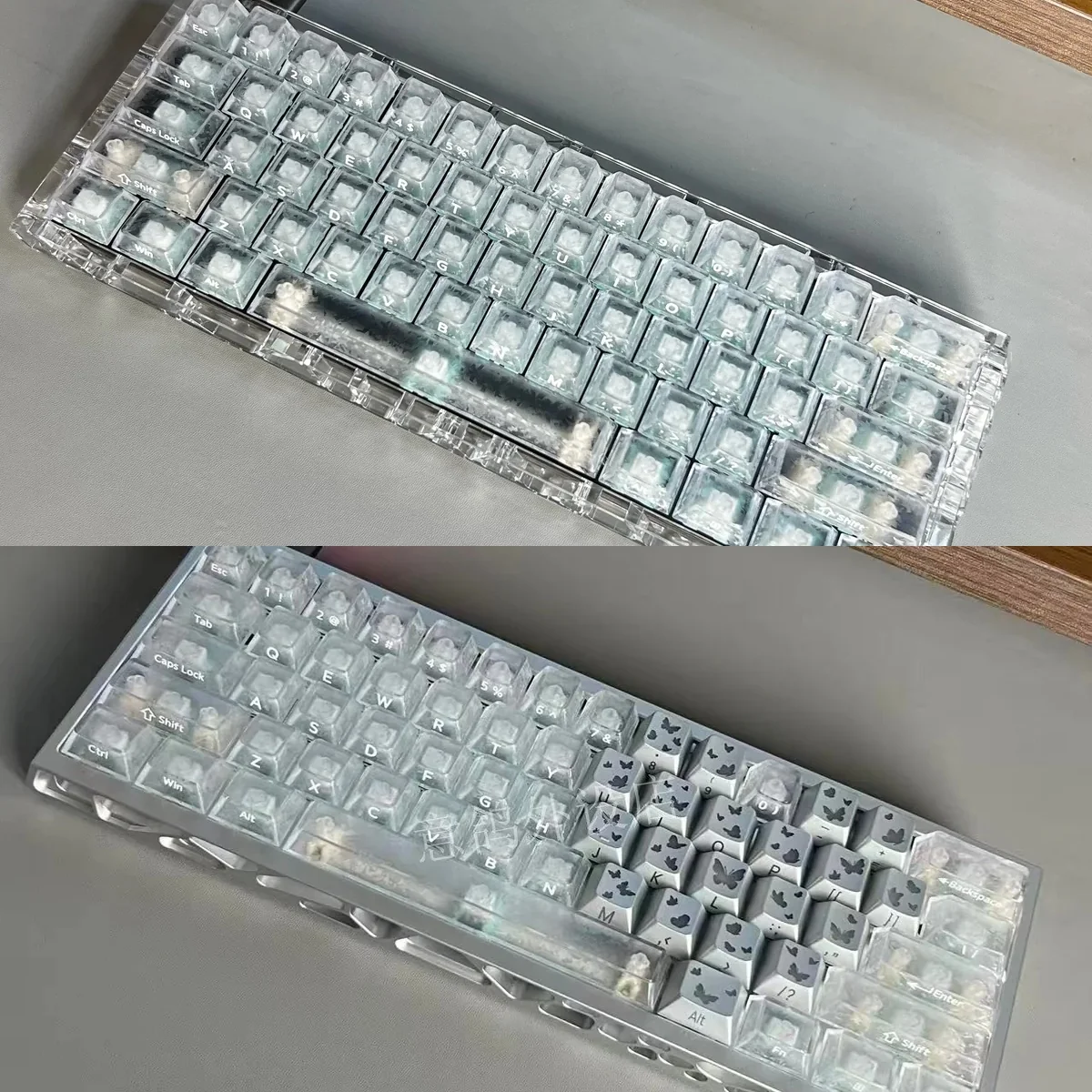 Premium forged carbon keycaps set display their unique texture and sleek side-lit legends, perfect for a high-tech gaming setup.