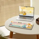 Whimsical MOA profile claw machine keycap set featuring an intricate miniature arcade scene with tiny, colorful prizes.