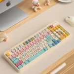 Whimsical claw machine keycap set featuring an intricate miniature arcade scene with colorful prizes, capturing delightful arcade nostalgia.