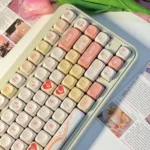 Red and white Love Diary Valentine PBT dye-sub keycaps set, showing playful hearts and love motifs from multiple angles for romantic expression.