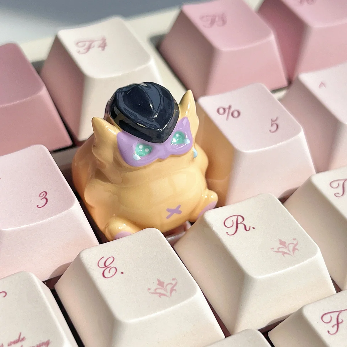 Artistic gallery views of the exclusive handcrafted Wingman Valorant keycap, showcasing the vibrant character's skill meticulous sculpting and playful gaming design.
