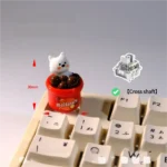 Multiple views of the whimsical handcrafted Westie dog artisan keycap, showcasing its adorable simplified line art and playful candy-inspired colors.