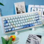 Stunning Whale Starlit Keycap Set, deep blue with ethereal starlit whales and celestial patterns, showcasing its artistic oceanic design.