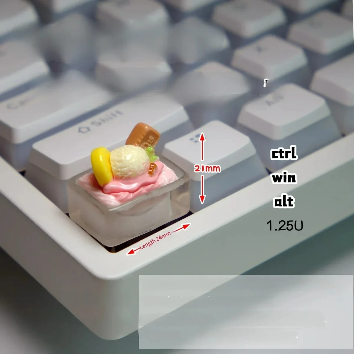 Whimsical handcrafted translucent pink ice cream keycap, featuring a realistic miniature scoop with a charmingly edible aesthetic.