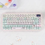 Whimsical Strawberry Pig PBT keycap set, playfully presented in a pastel pink can, offering broad compatibility for various keyboard layouts.