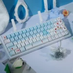 Premium Winter PBT Dye-Sub Keycaps Set, a 120-key set. Soft pastel blue and pink evoke a cozy winter romance aesthetic.