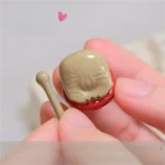 Artistic gunmetal grey Handcrafted Wooden Fish Keycaps, featuring an upgraded high magnetic design, brings a serene touch to mechanical keyboards.