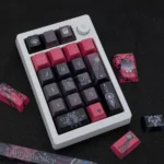 Exclusive Wriothesley 2.0 side-print keycaps set displayed from multiple angles, featuring deep blue and ice-themed legends, capturing the unique Genshin Impact design.