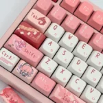 An exclusive Yae Miko Genshin Impact MDA keycap set, showcased from multiple artistic angles, revealing elegant mystical fox motifs and vibrant character design.