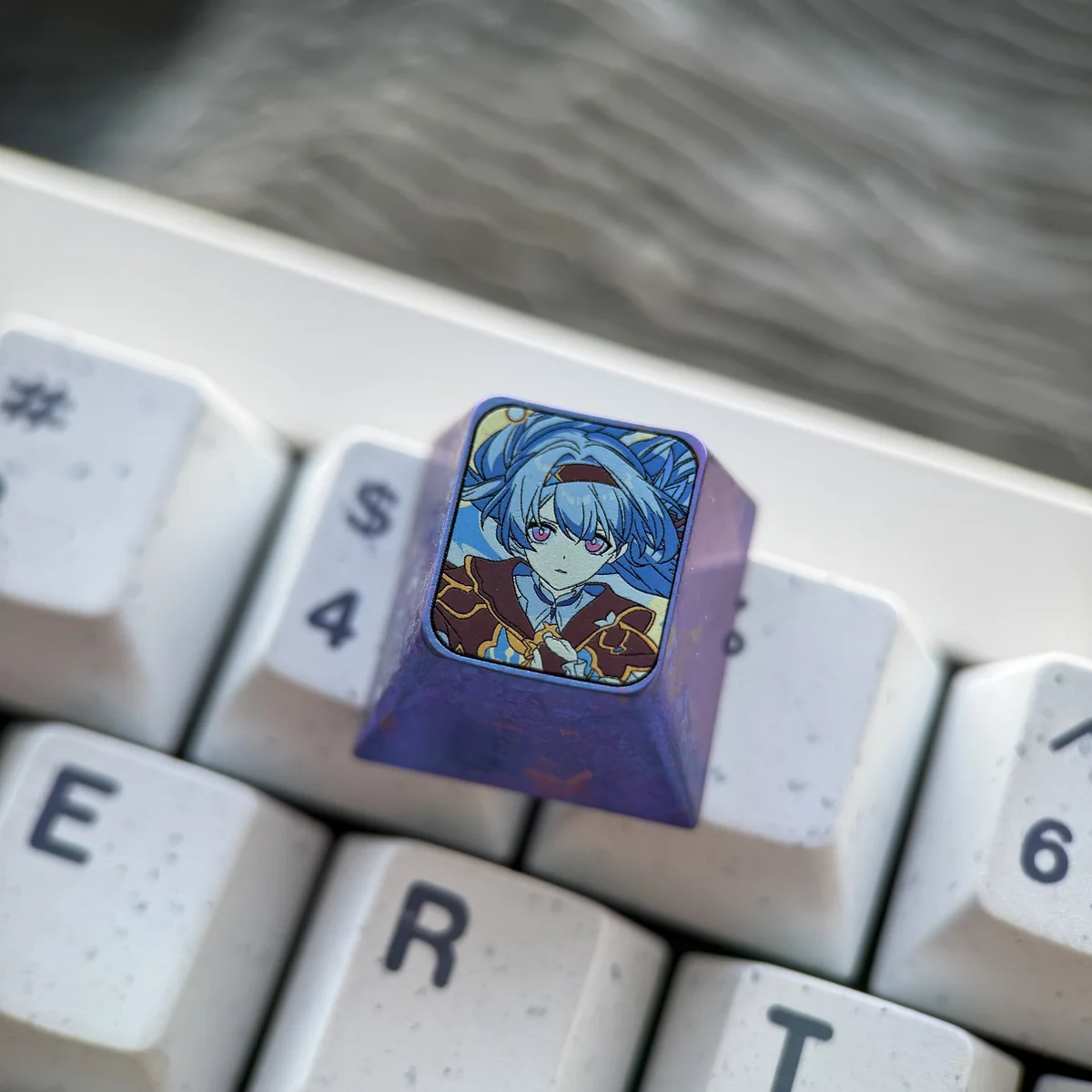 Handcrafted Ethereal Firefly titanium artisan keycap, an ESC key with a delicate insect motif, vibrant iridescent glow, and metallic sheen.