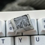 Premium Asuka Titanium Keycap EVA-02 Ctrl 1.25U, showcasing vibrant design anime details and precision metallic finish from multiple angles.