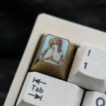 A premium titanium Asuka Langley Soryu artisan keycap, showcasing intricate Evangelion details and vibrant colors from multiple angles.