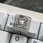 Exquisite Wuthering Waves Titanium Artisan Keycap showcasing intricate game character art with vibrant enamel-like coloring on polished metallic.