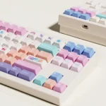 Whimsical Balloon Party PBT Dye-Sub keycaps set showcased from a playful, angled view, revealing vibrant pink balloon graphics and magnetic switch compatible.