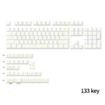 Close-up of Baroque PBT Dye-Sub keycaps set showcasing intricate platinum patterns and elegant neutral tones, highlighting exquisite artistry and PBT durability.