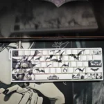 Close-up of the iconic Batman side-engraved PBT keycaps set, revealing the subtle shine-through legends with a mysterious Gotham glow.