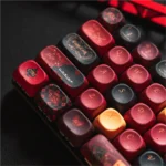 Black Spade Queen MOA PBT keycap set, viewed from an elegant side angle, showcasing the unique MOA profile and durable PBT material with a monochromatic design.