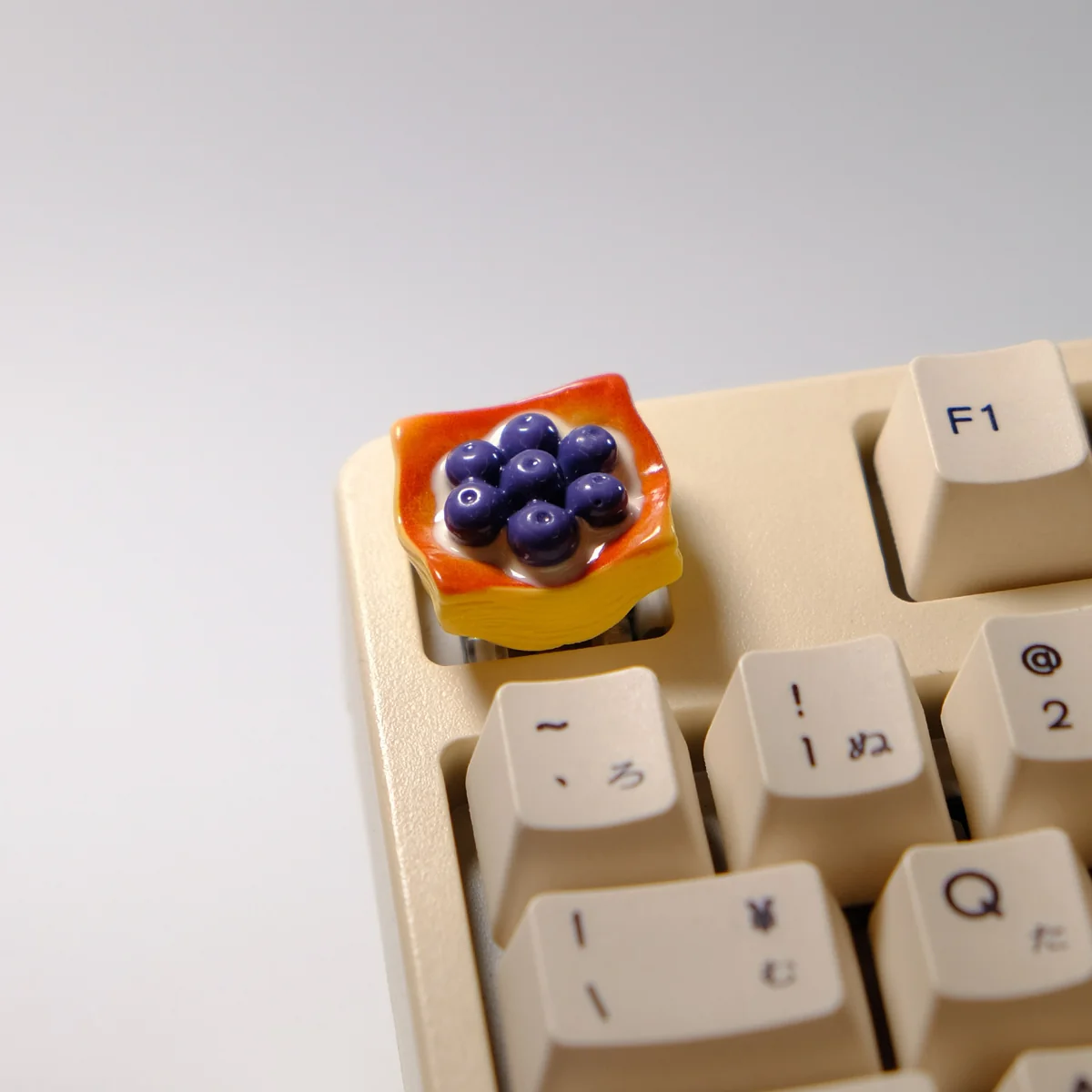 Exquisite Blueberry Mille-Feuille artisan keycap, showcasing vibrant pastry layers and creamy white accents. A delightful dessert-themed keyboard masterpiece.