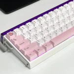 Charming Butterfly Heart-Shaped PBT Keycaps Set: multiple angles of whimsical pink butterflies and delicate hearts on romantic pastel dye-sublimated art.