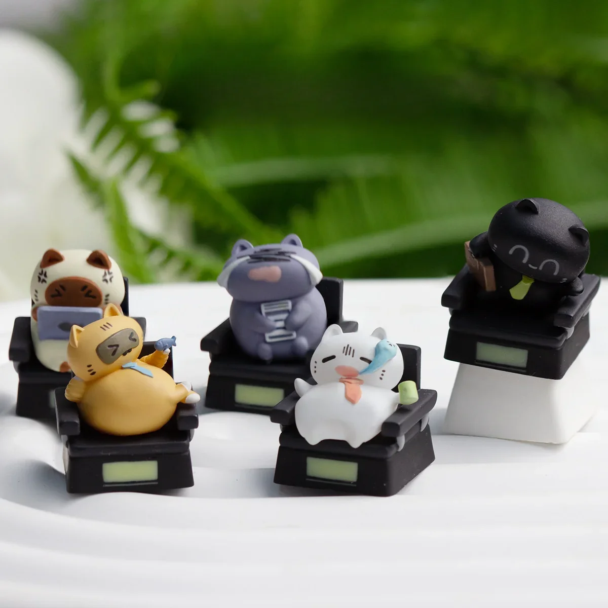 Charming handcrafted resin Cat Worker artisan keycap for ESC, featuring a playful sculpted cat figure in a relatable office scenario.