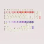 Whimsical Cheese Berry PBT keycaps from the dessert set, showcasing pastel illustrations of cheese, strawberries from various angles for perspective view.