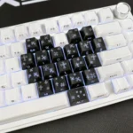 Black PBT Gothic Heart keycap set, 21 side-engraved keys with a backlit, edgy motif, compatible with 99% of keyboards.